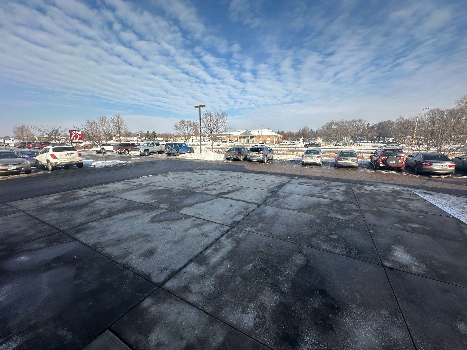 Restaurant front entry sidewalks shoveled and salted in Minnesota