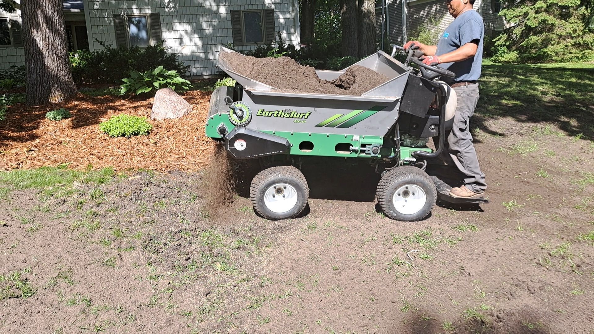 Power cart loaded with organic compost. 