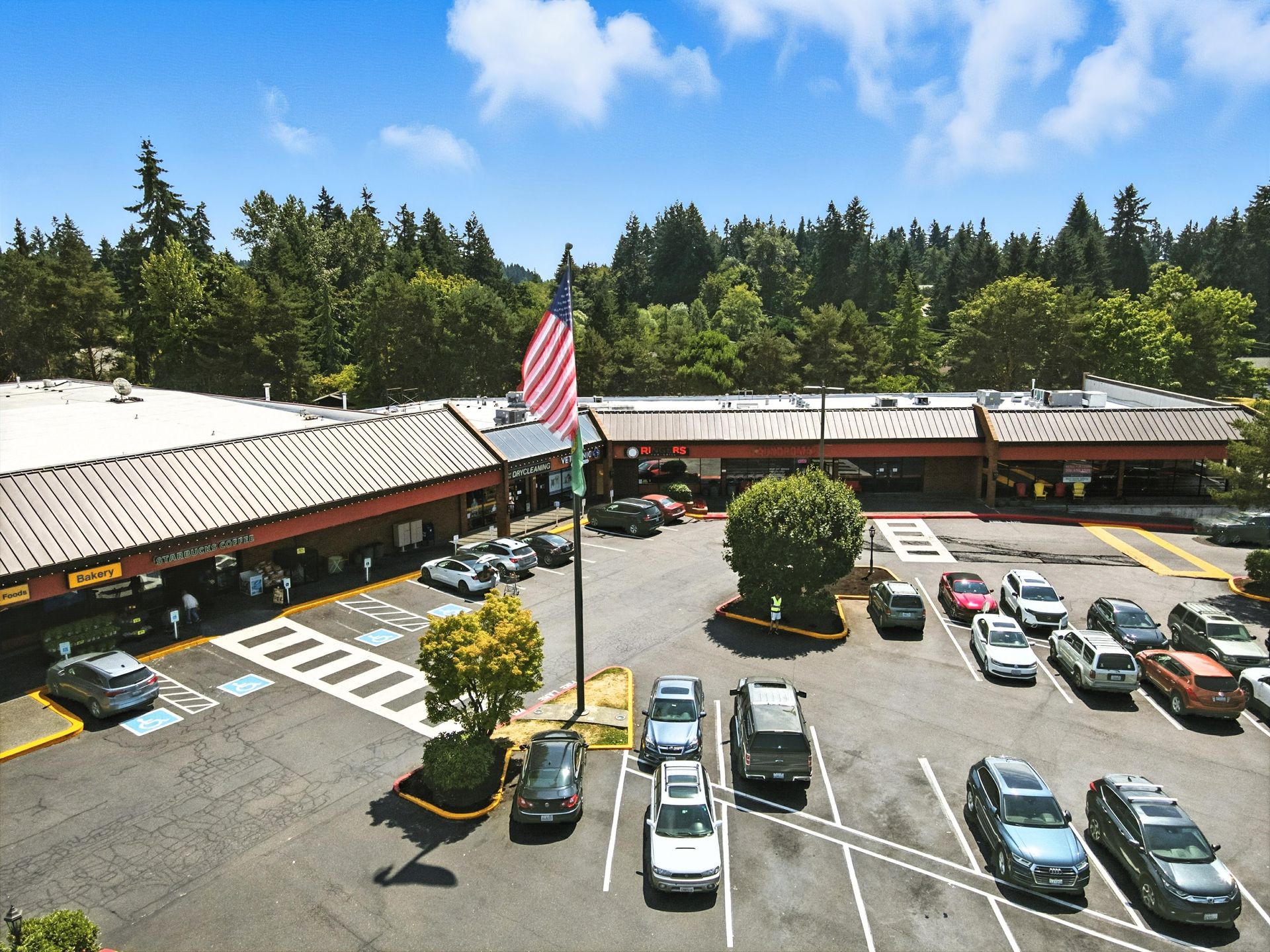 Stores and parking lot at Cedar Plaza in Mountlake Terrace