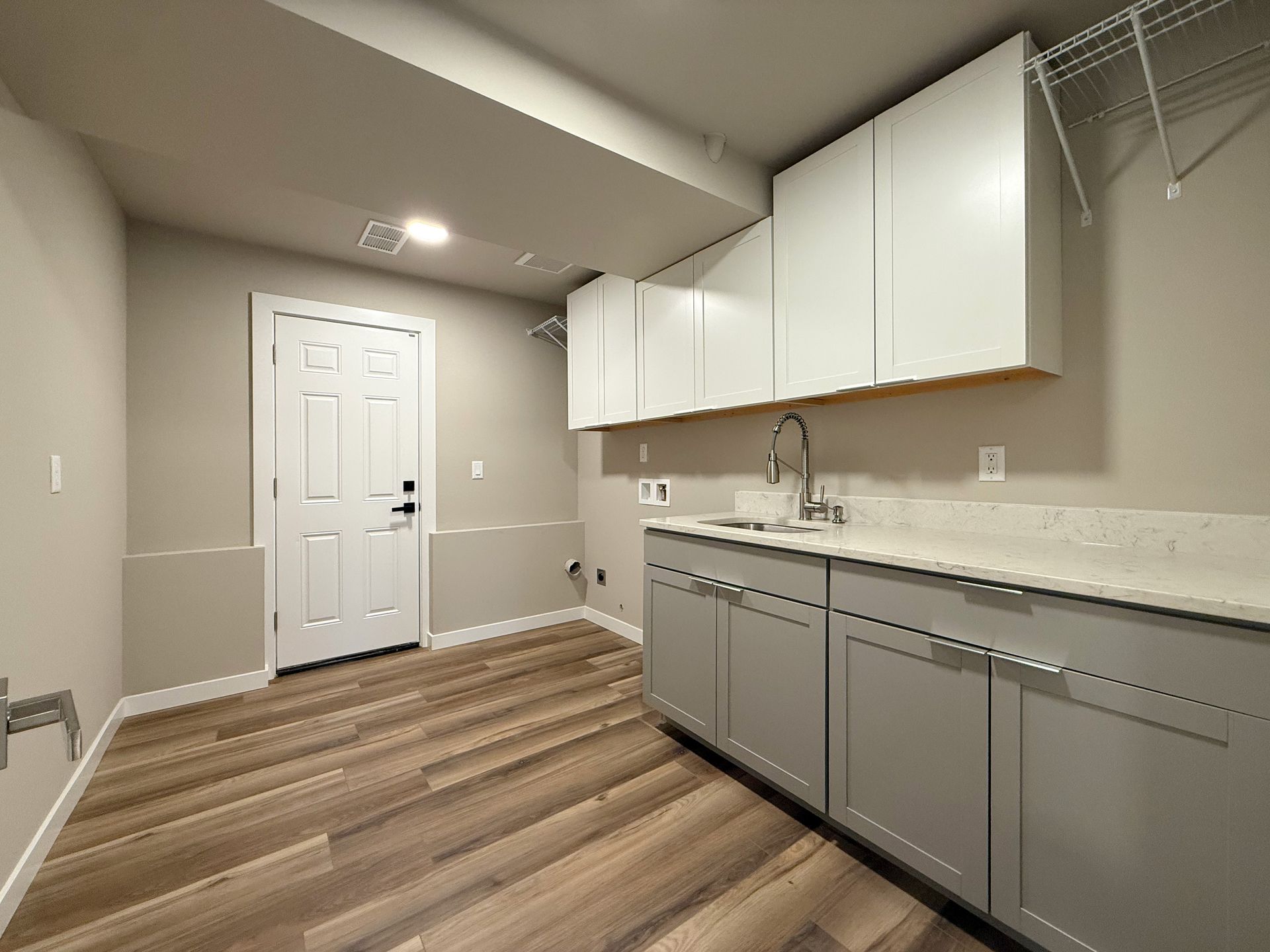 Utility room with cabinets