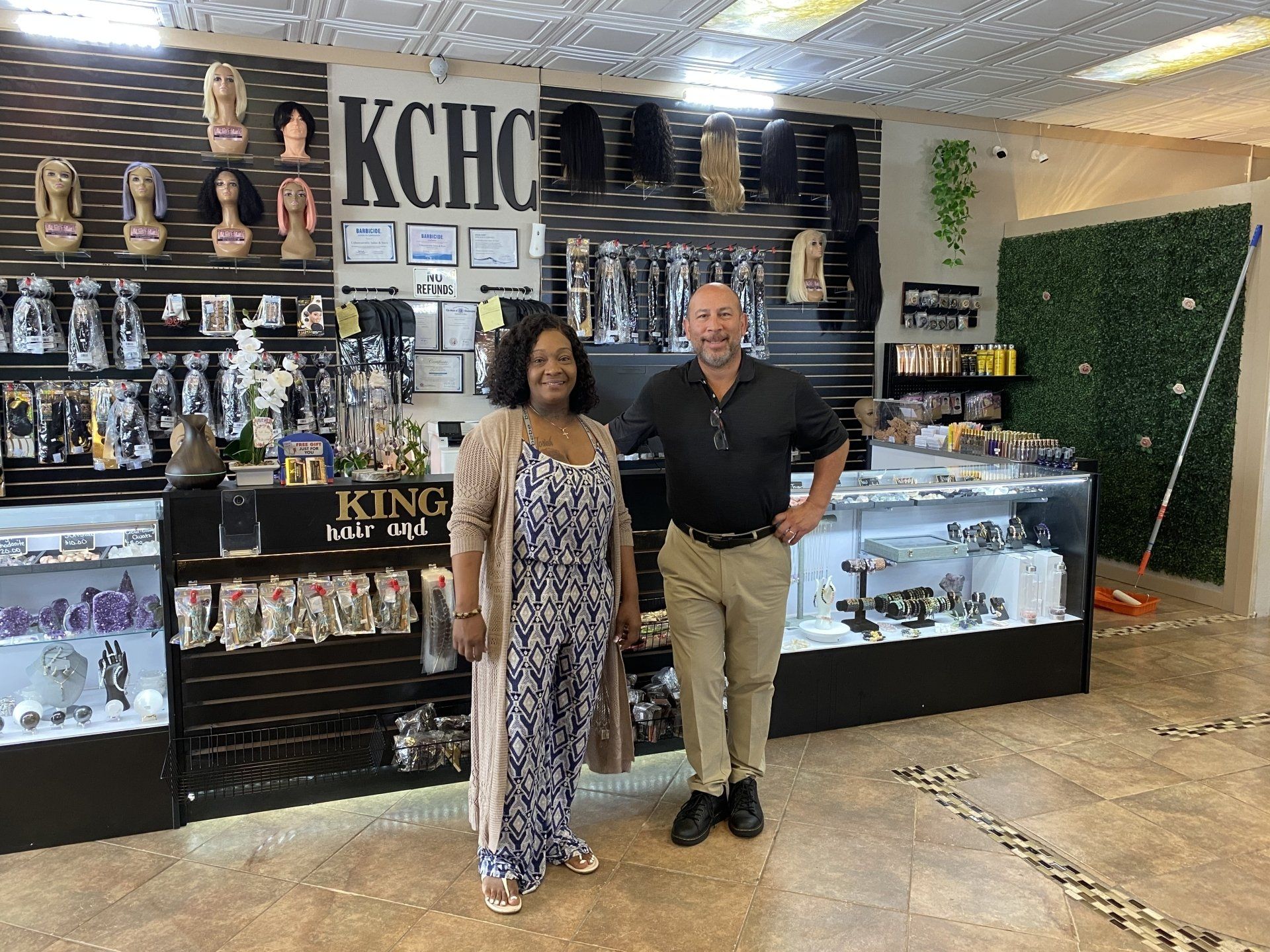 Interior of Unbeweavable Salon with Owner and Real Estate agent