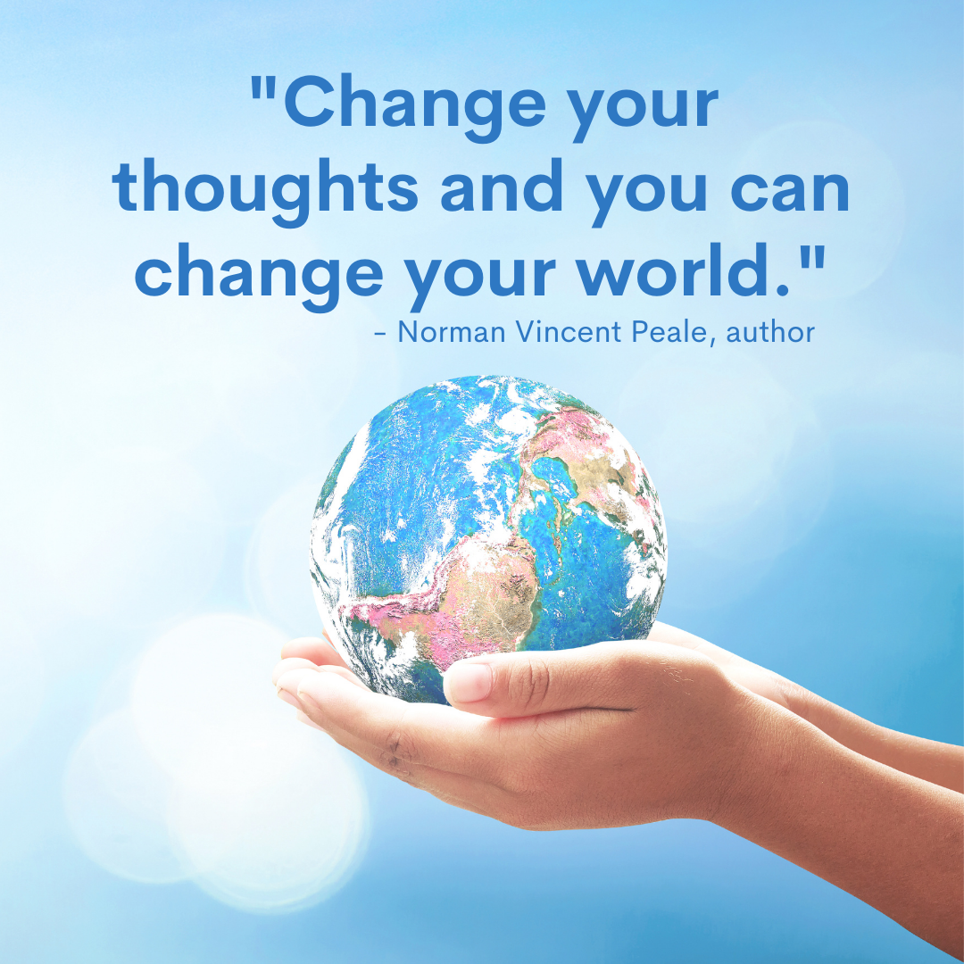 Hands holding a globe with text: