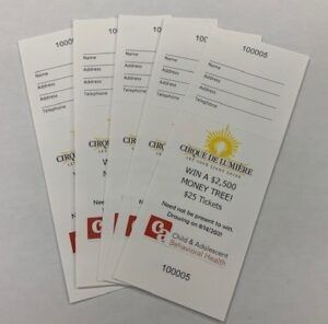 Four white raffle tickets; chance to win $2,500; logo for Cirque De Lumiere and Child & Adolescent Behavioral Health.