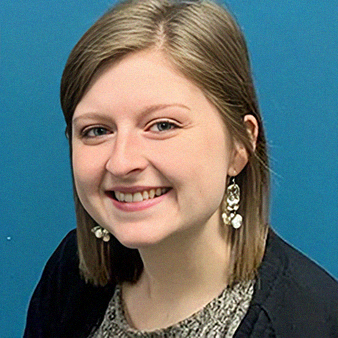 Smiling woman with light skin, short blonde hair, and earrings; in front of a teal background.