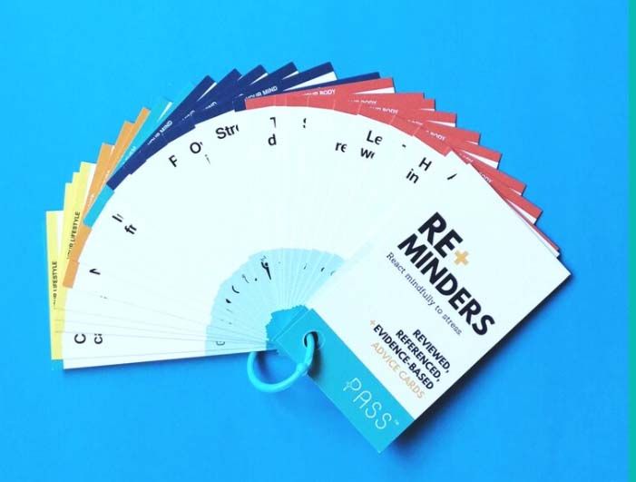 Deck of color-coded reminder cards attached to a blue ring, titled 