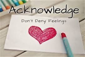 White paper with red heart drawing and text 
