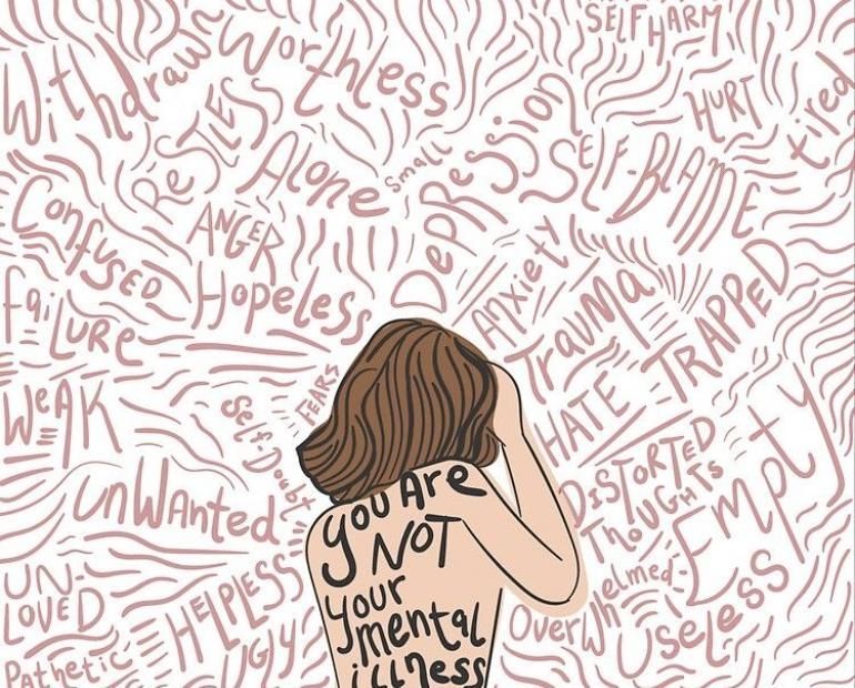 Woman with back to viewer surrounded by words related to mental illness, text on her back says