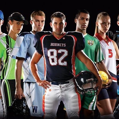 Athletes in various sports uniforms standing together, including football, soccer, and baseball.