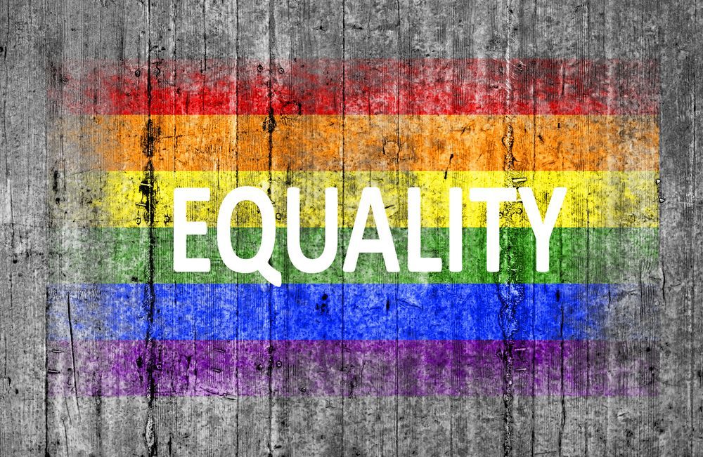 Rainbow flag with the word
