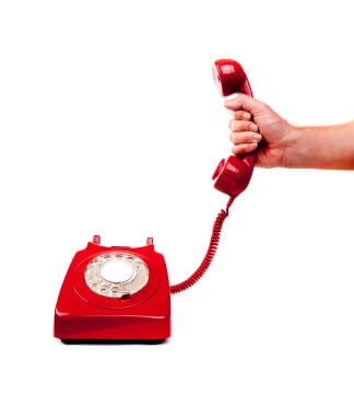Red rotary phone with a hand holding the receiver up, as if answering a call.