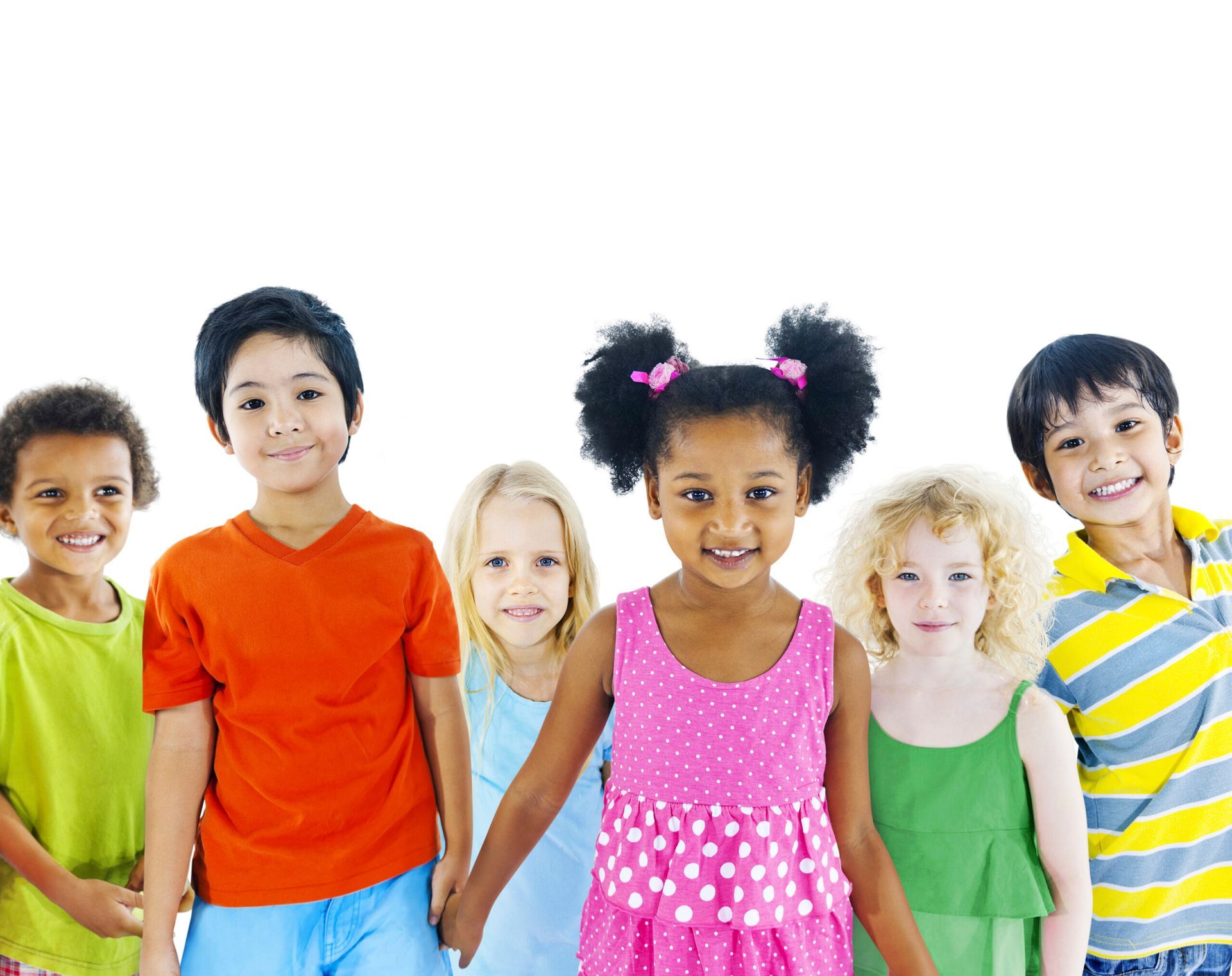 Group of diverse children smiling, standing together, against a white background.