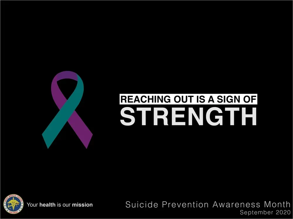Purple and teal ribbon for suicide prevention with text: Reaching out is a sign of strength.