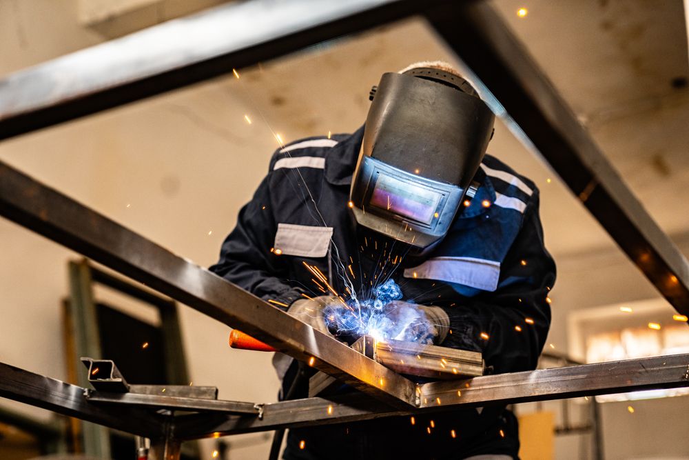 Man with Welding Tool — Woolgoolga, NSW — RT Welding Services Pty Ltd