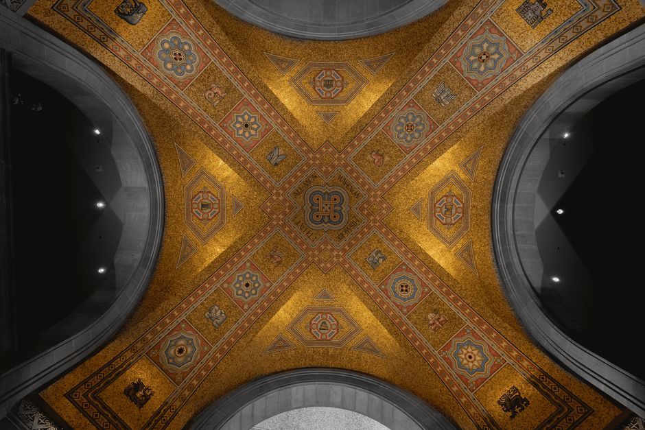 Symmetrical architectural detail in gold tones