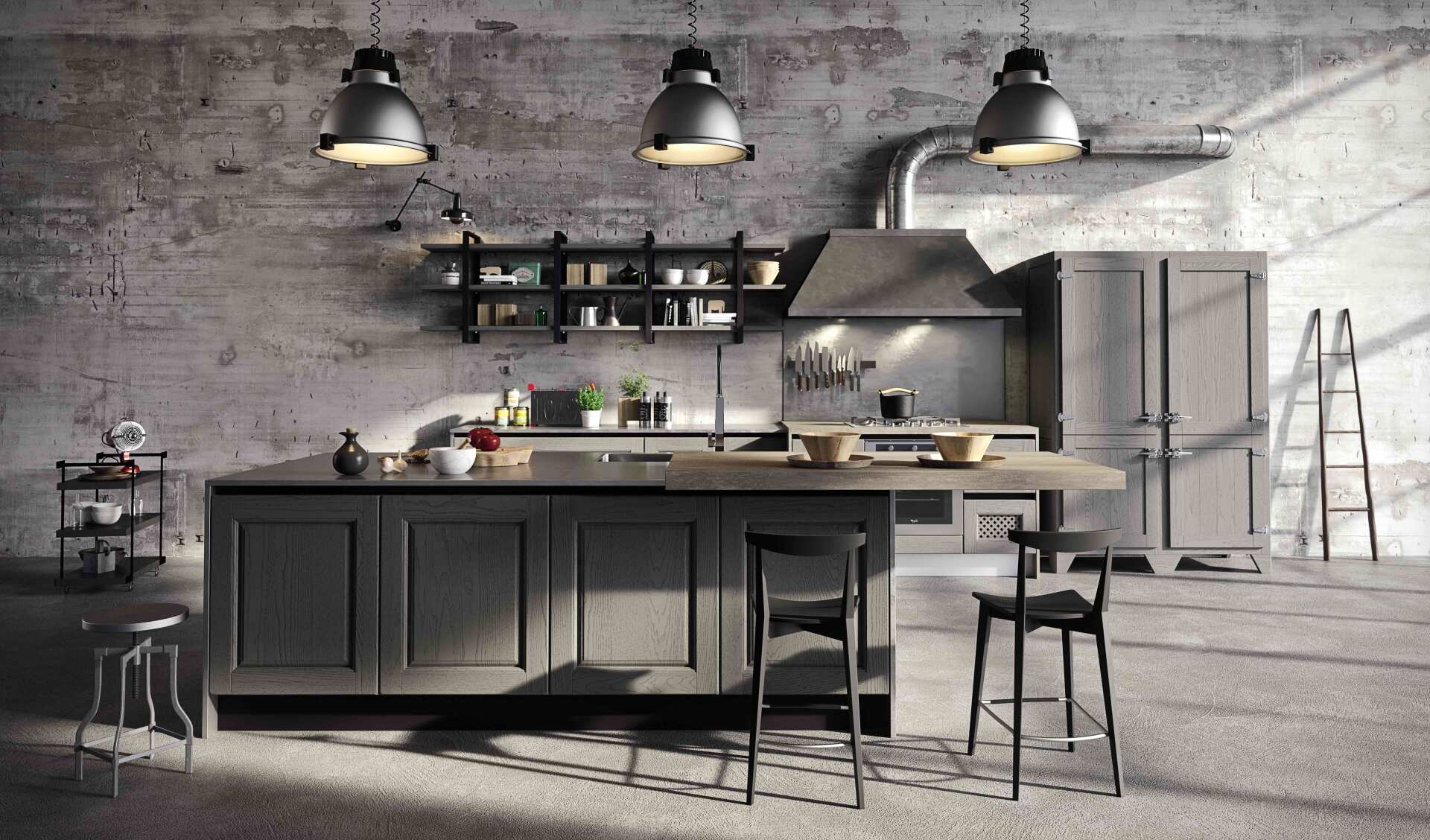 Cucina industriale Aran con isola grigia, pareti in cemento, ripiani in metallo nero e lampade a sospensione.