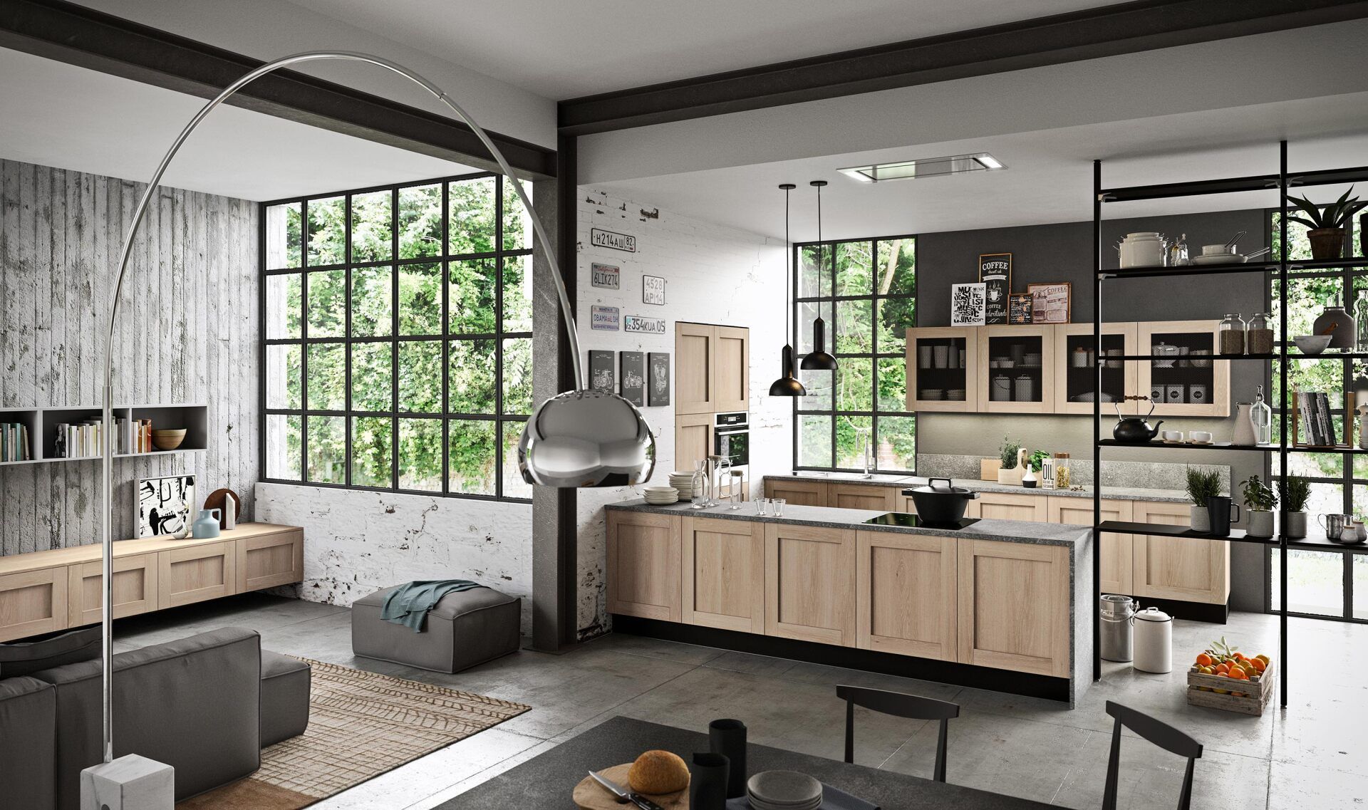Cucina e soggiorno moderni con ampie finestre, mobili in legno chiaro e dettagli grigi.