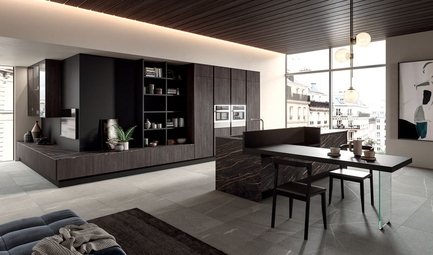 Cucina moderna con mobili in legno scuro, isola in marmo e vista sulla città.