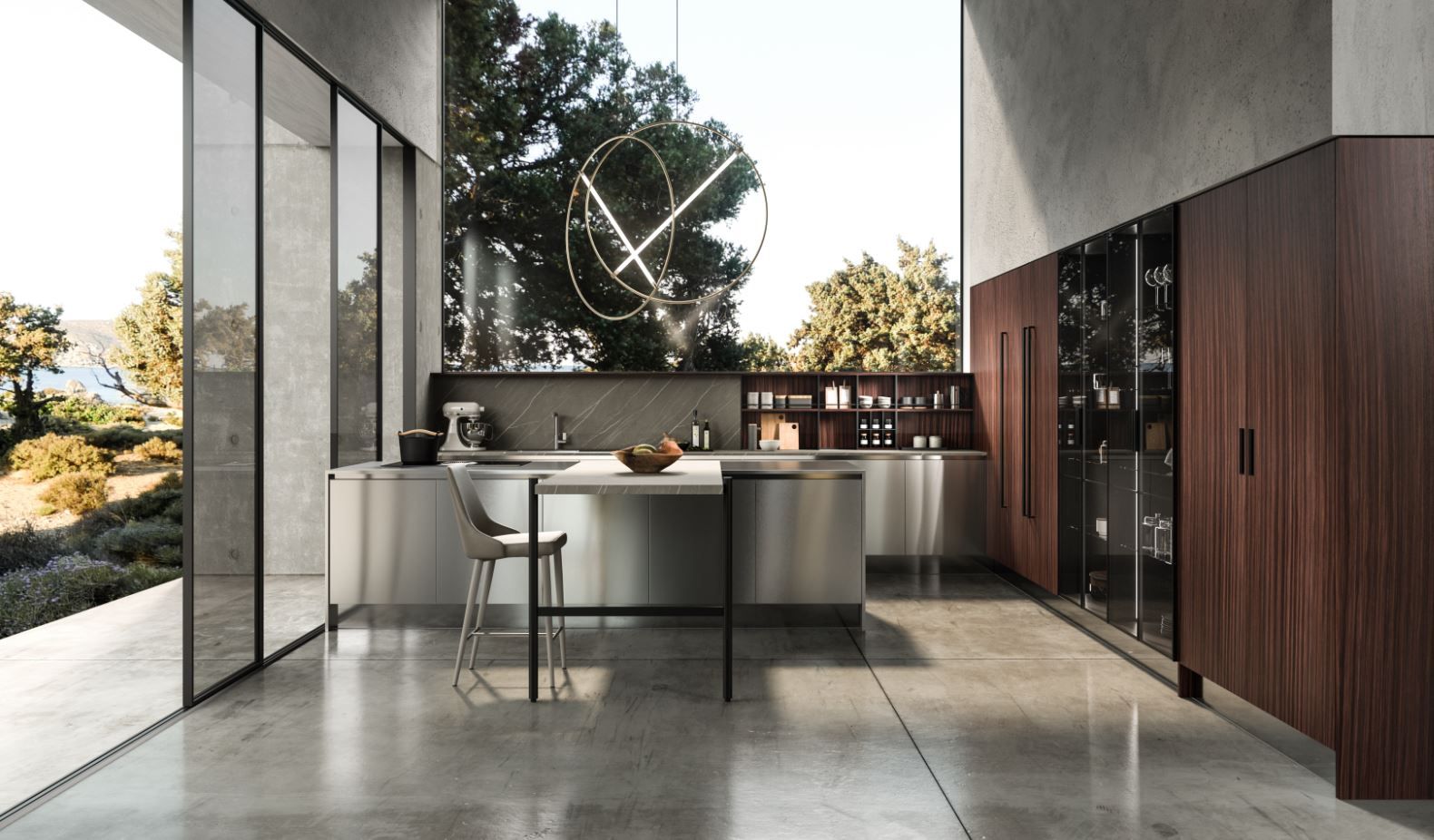 Cucina moderna Aran con isola in acciaio inox, mobili in legno e ampie finestre con vista sull'esterno.