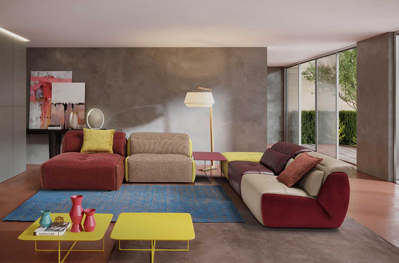 Soggiorno moderno con divano componibile nei colori rosso, crema e giallo, opere d'arte e dettagli colorati.