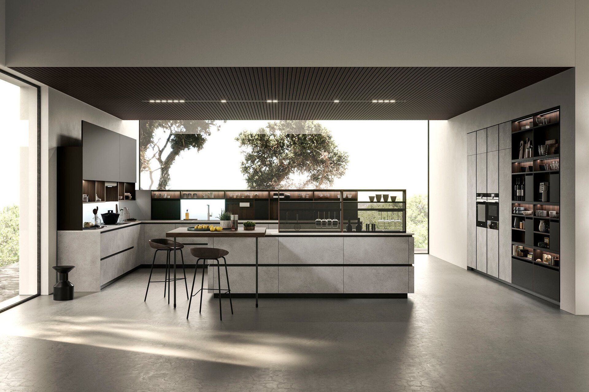 Cucina moderna con grande isola, finestre a tutta altezza ed elettrodomestici integrati.