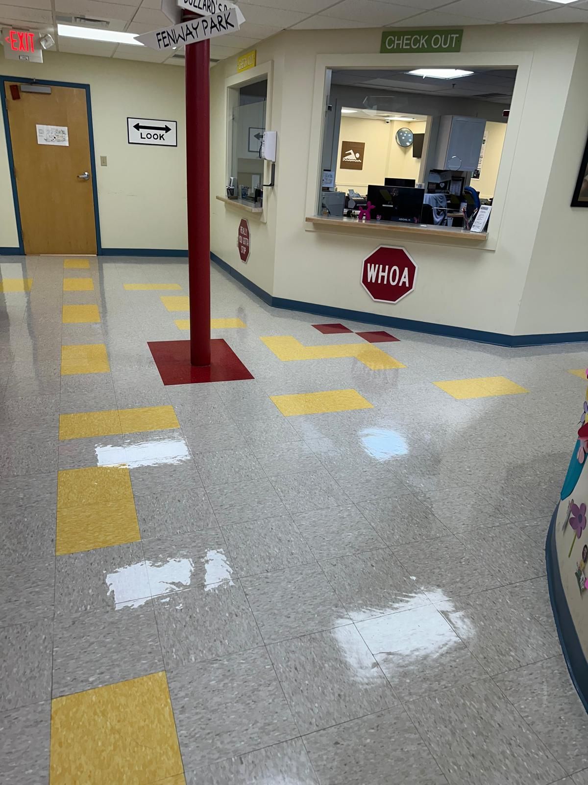 A room with a stop sign on the floor