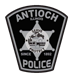 Antioch Illinois Police badge: black shield, silver star, text