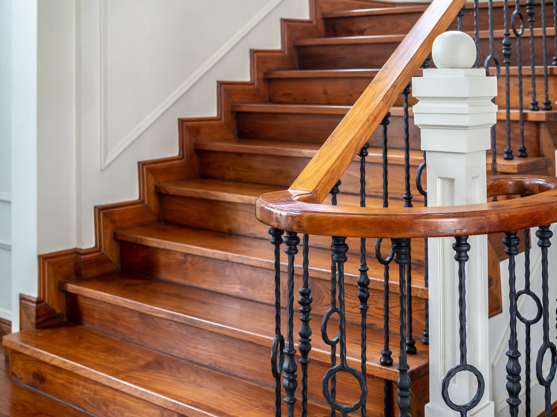 Wooden Staircase with Wrought Iron Railing — Clackamas, OR — J & B Hardwood Floors Inc.