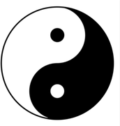 Black-and-white yin-yang symbol with two dots inside a circle