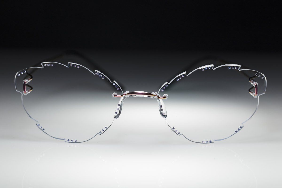 rimless glasses with pink diamonds
