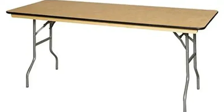 Folding banquet table with tan top and gray metal legs