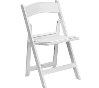 White folding chair with a built-in writing desk arm on a plain background