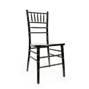 Black wooden chair with a tall slatted back and straight legs on a white background