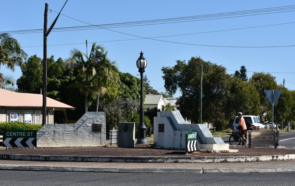 A Street Corner With a Sign That Says 'Centre St' on It — Leonard Gray Roof Tiling In Casino, NSW