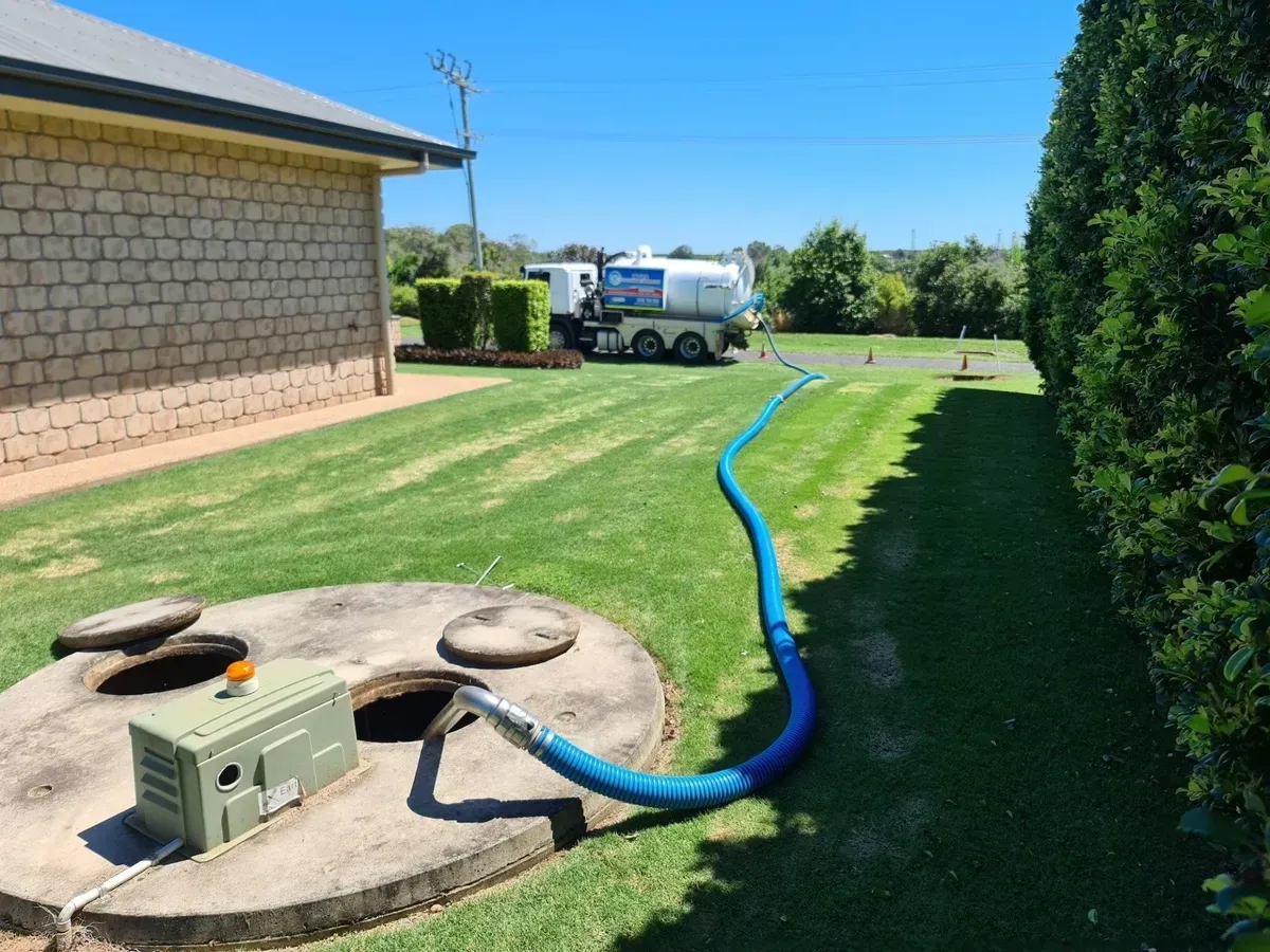 A Septic Tank is Being Serviced by a Pump Truck — Paap's Cleansing Services in Branyan, QLD