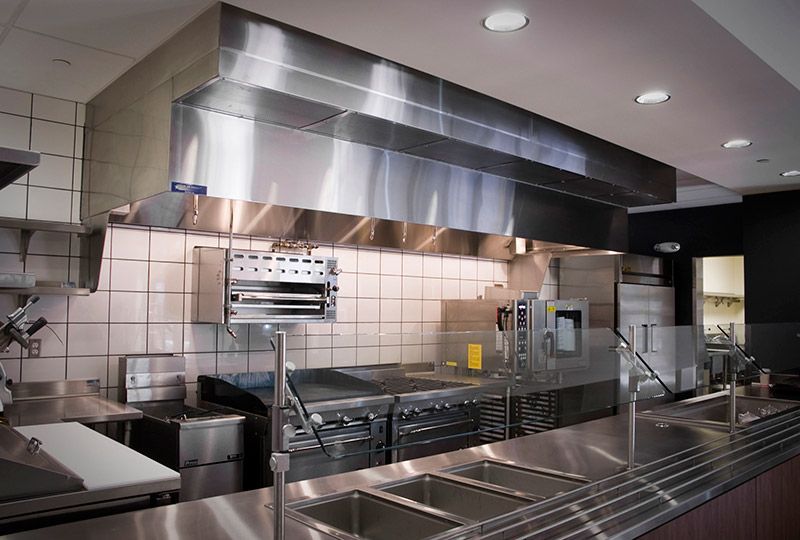 A kitchen with stainless steel appliances and a sink