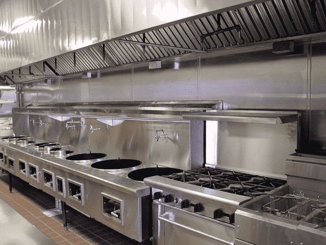 A kitchen with a lot of stainless steel appliances