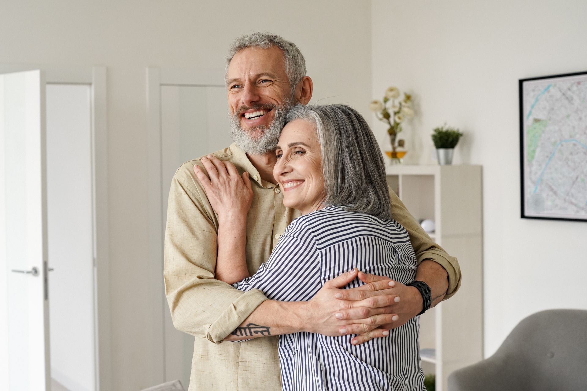 Hugging senior couple