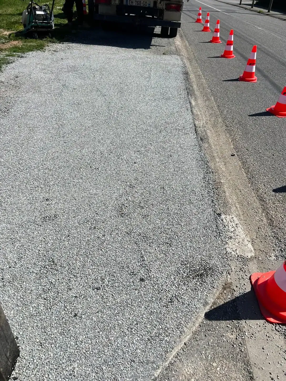 Réfection de voirie en enduit superficiel bicouche après travaux de réseaux