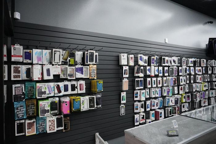 A store filled with lots of cell phones and cases.