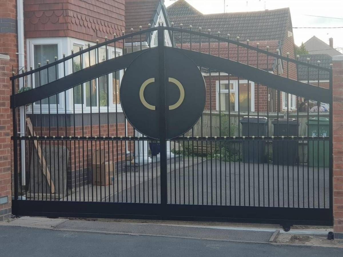 Metal Gates & Railings Derby Arched single sliding metal driveway gate
