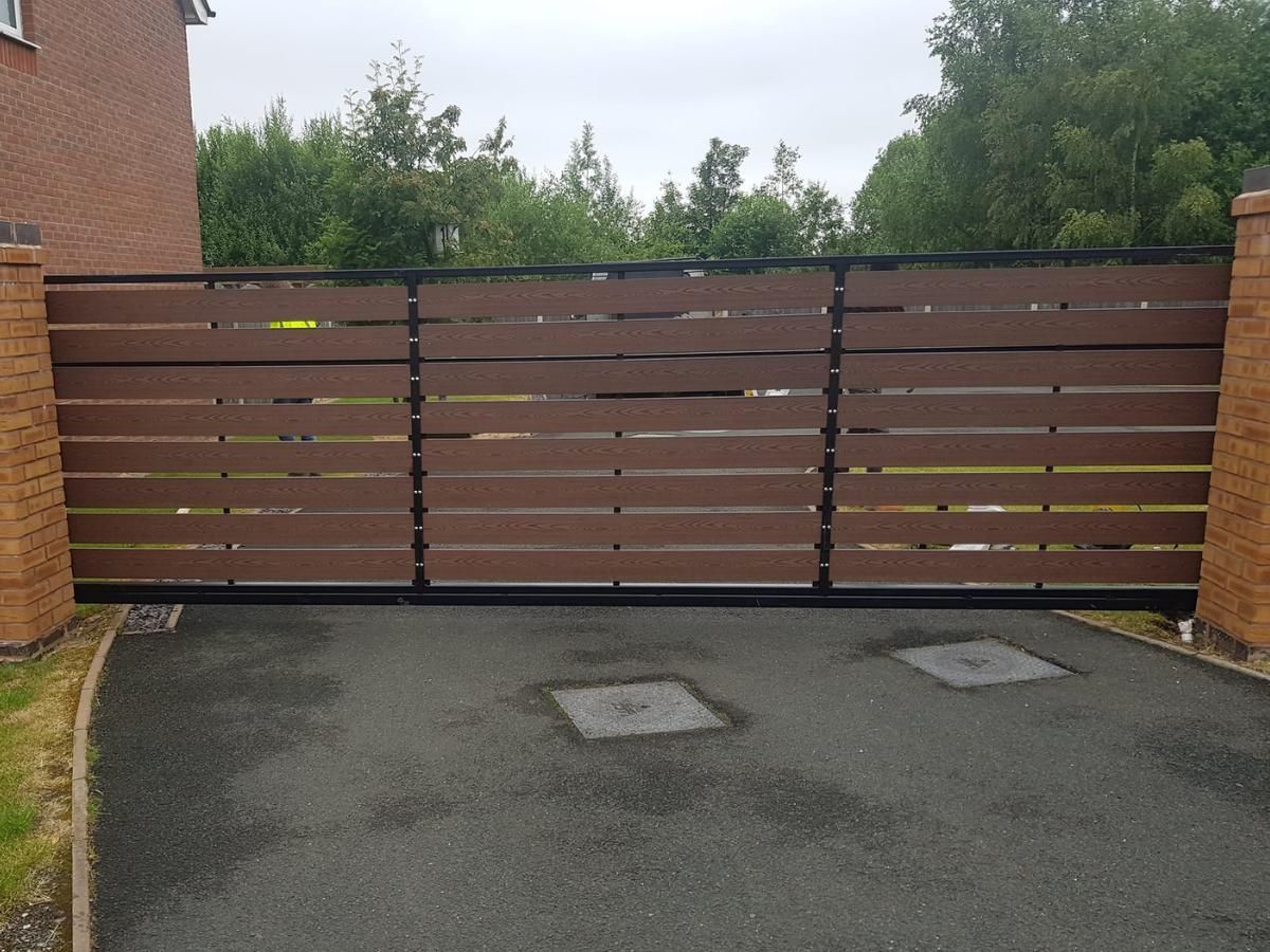 Metal Gates & Railings Derby gold basket in wrought iron gate