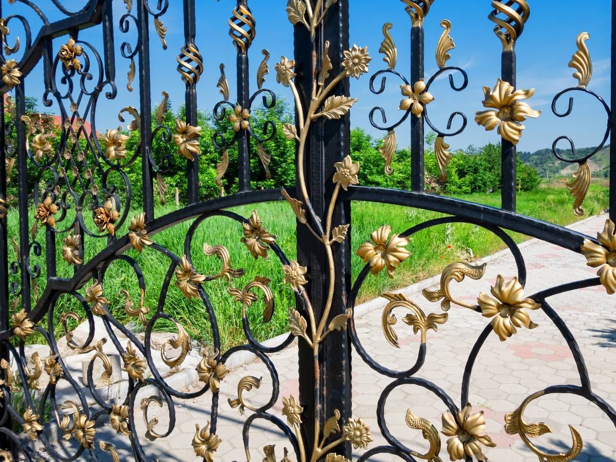 Metal Gates & Railings Derby wrought iron gates with gold baskets and decorative floral and scroll features