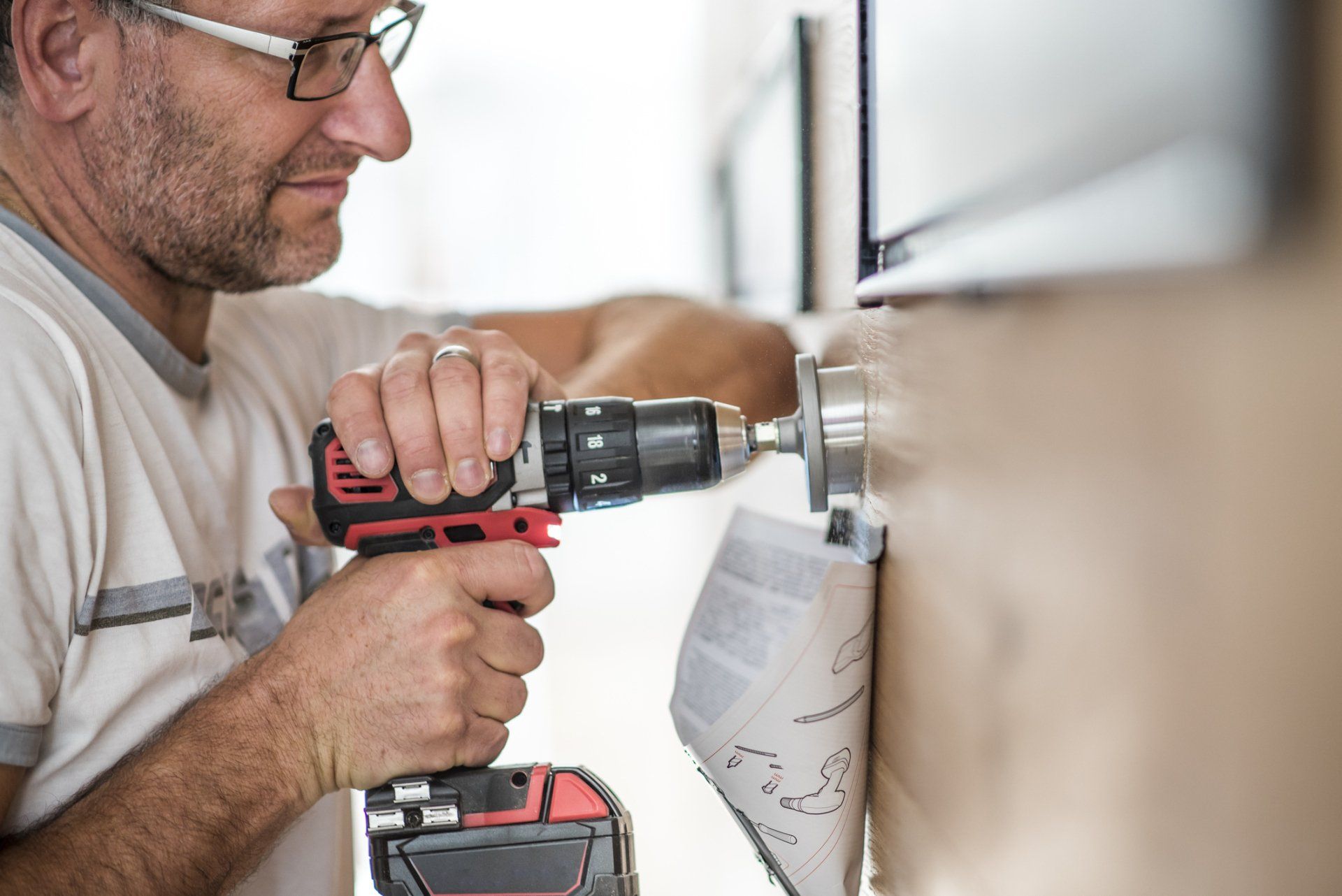 Man Drilling A Door Lock - Smyrna, DE - A & S Locksmith Man Drilling A Door Lock - Smyrna, DE - A & S Locksmith