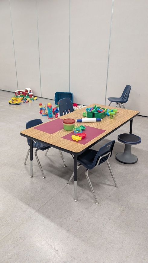 Children and caregivers participating in a Mobile Early Learning activity