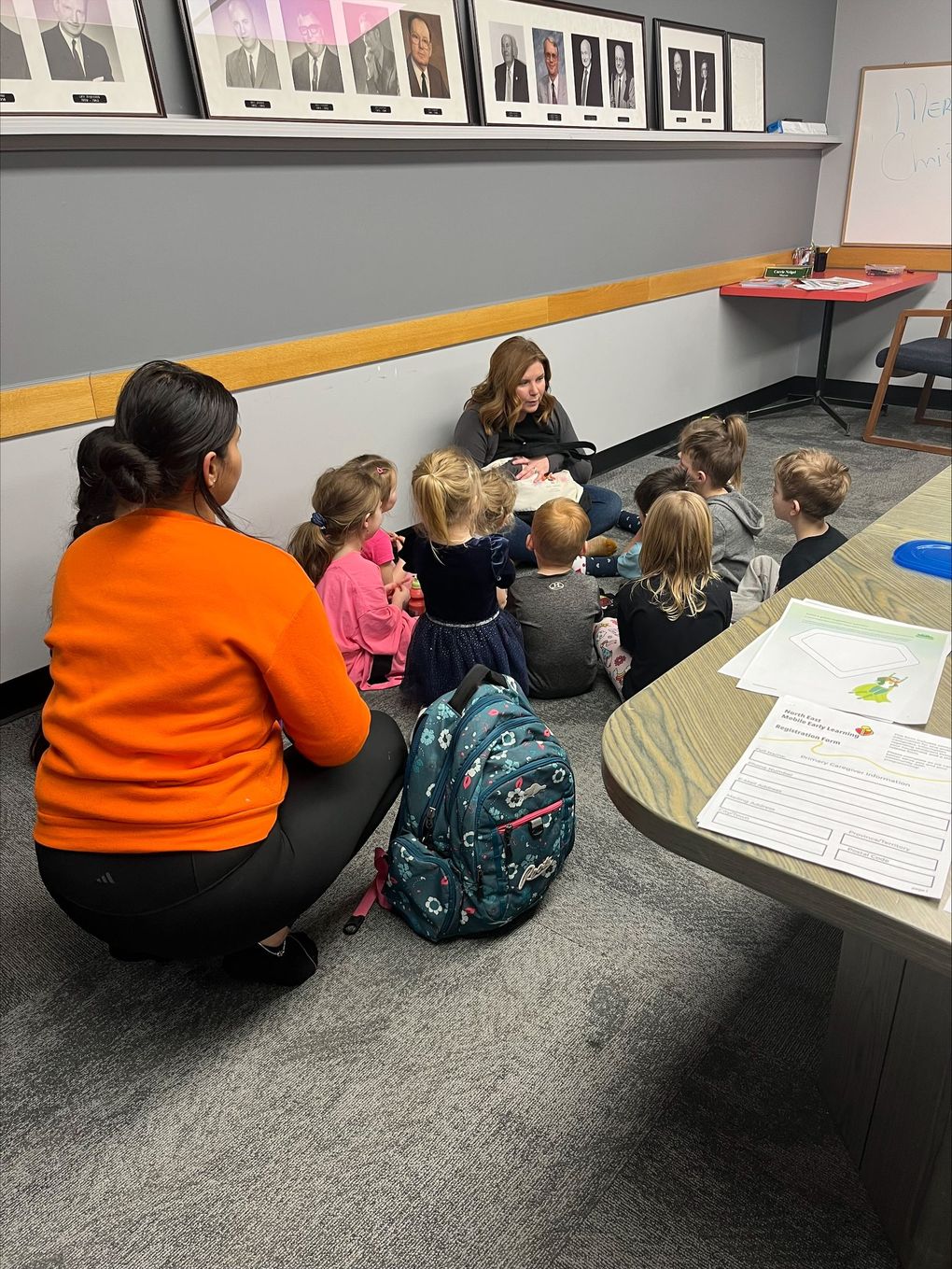 Children and caregivers participating in a Mobile Early Learning activity