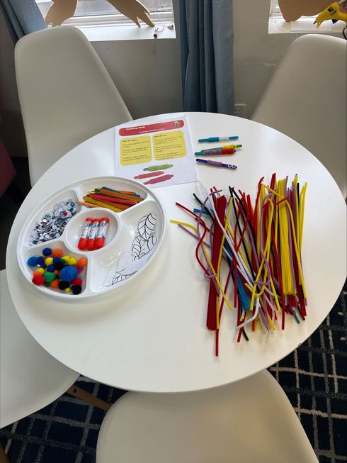 Children and caregivers participating in a Mobile Early Learning activity