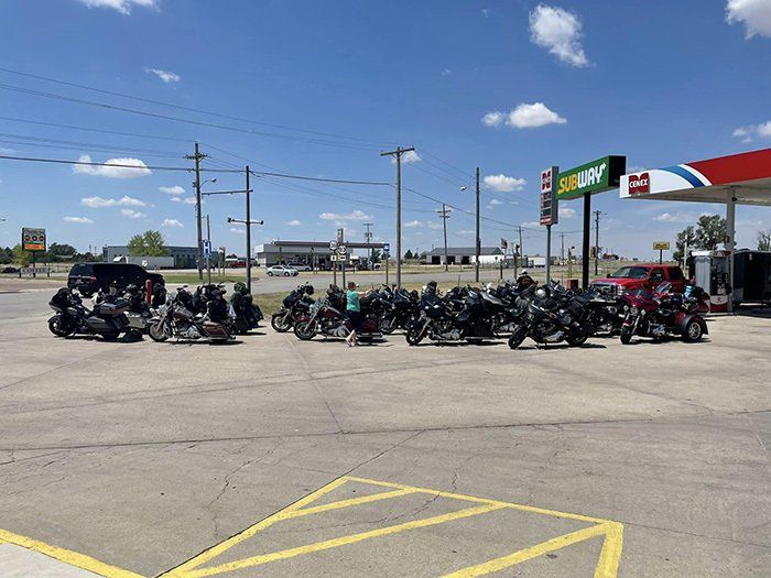 bikes lined up by gas station