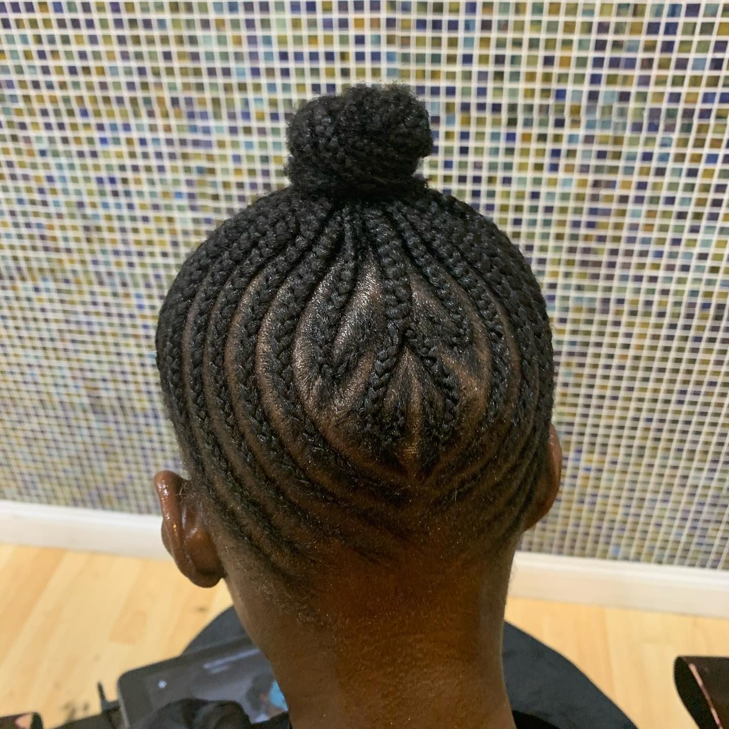 A woman with braids in her hair