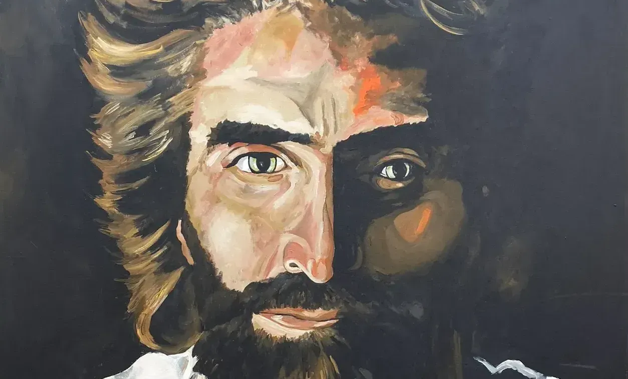 A painting of Jesus Christ with short hair and thick eyebrows, mustache, and beard.