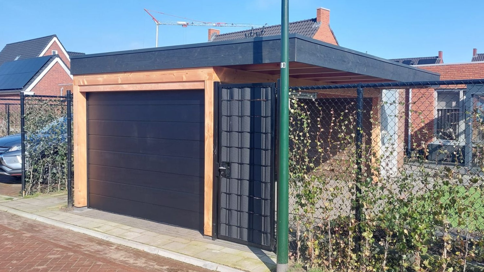 Carport met garagedeur in Erp | Smans Houtbouw